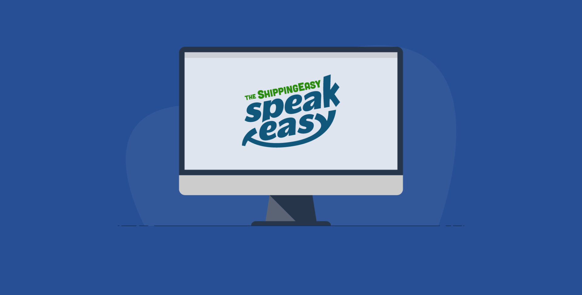 A computer monitor sits on a desk with The ShippingEasy SpeakEasy logo on the monitor.