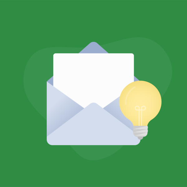 Envelope with a paper inside next to a lightbulb